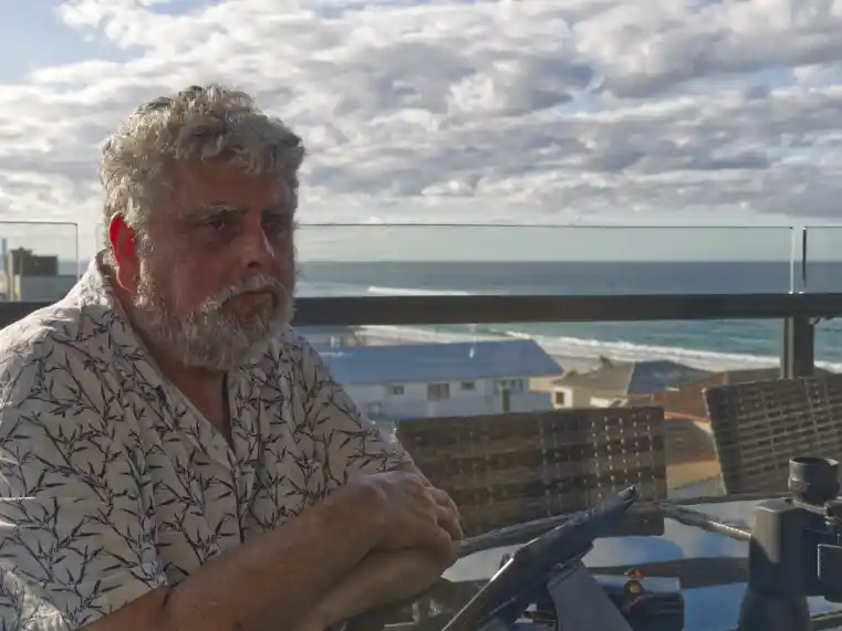 Joff Relaxing on the balcony of the Air B n' B in Coolangatta in 2023