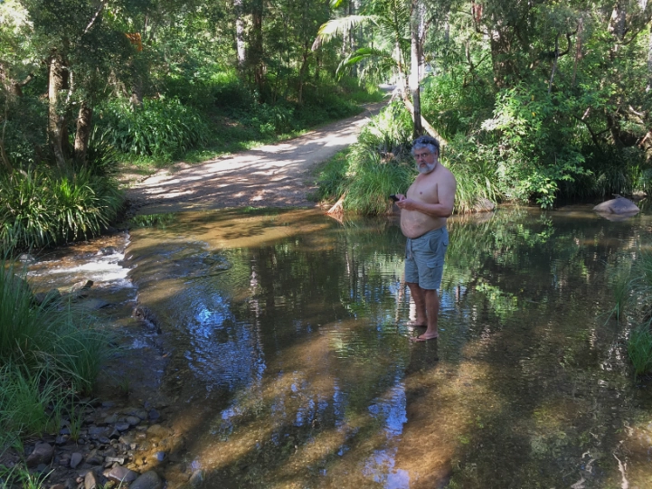 Joff in his trademark shorts and thongs standing in Byrril Creek in 2016